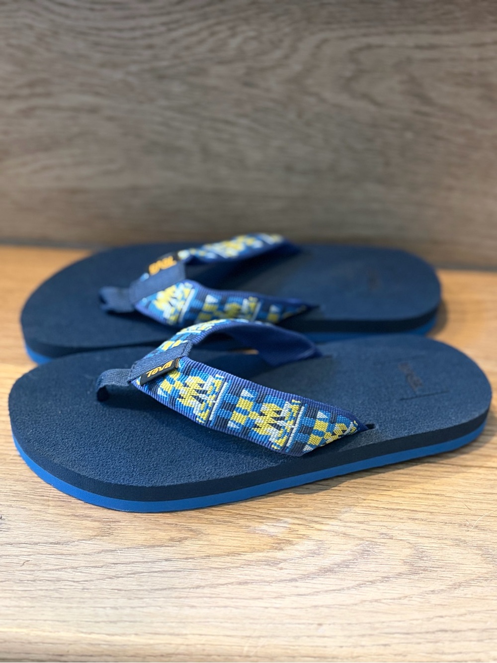 Teva Kids Navy Flip Flops with Blue and Yellow Patterned Straps